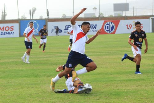Free Intense soccer match capture with players mid-action on the field. Stock Photo