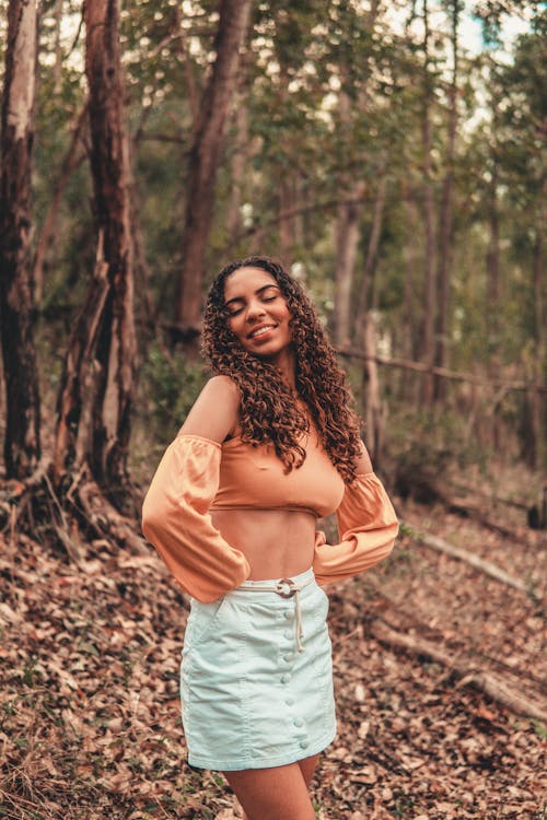 Woman Smiling in Forest