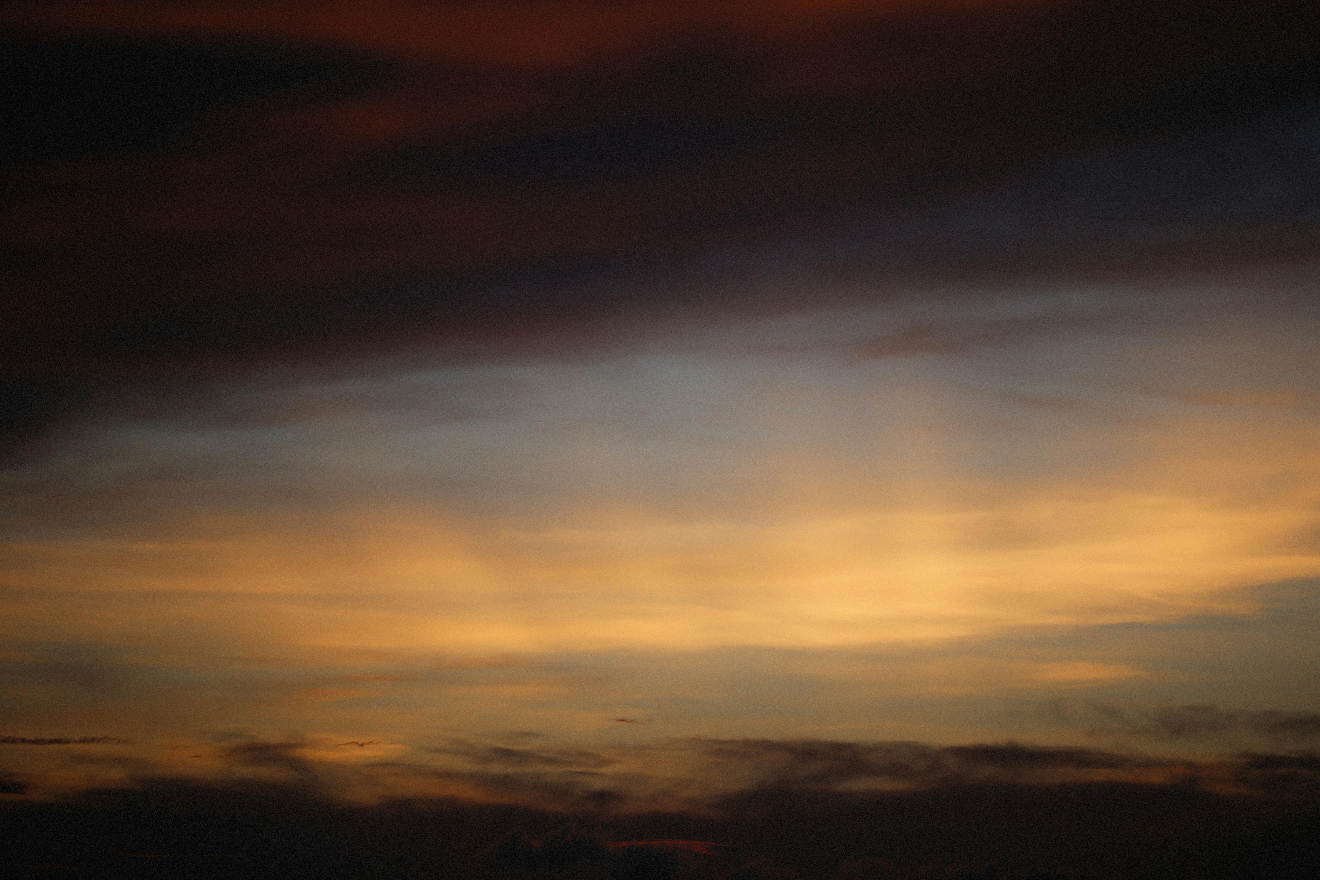 Soft Clouds Up In The Sky During Sunset by Stocksy Contributor Marilar  Irastorza - Stocksy