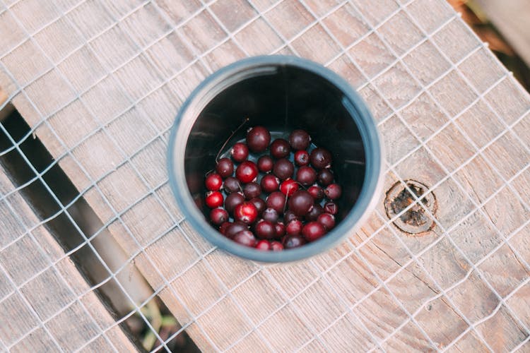 Overhead Shot Of A Cup Full Of Cranberries