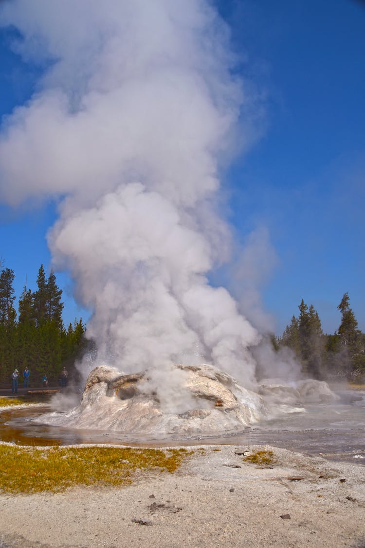 Superheated Steam Over A Geyser In Yellowstone National Park