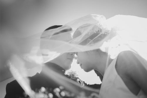 Grayscale Photo of a Newlywed Couple 