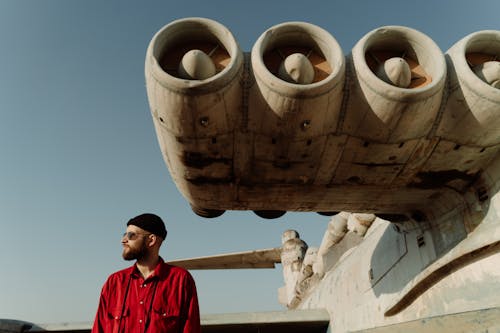 A Man Standing Beside the Flarecraft