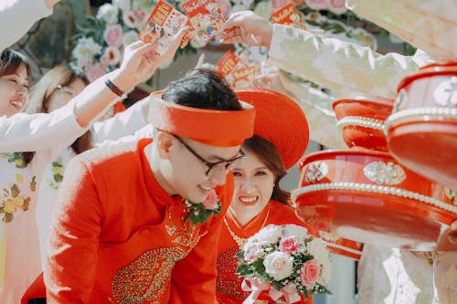 Woman and Man in Traditional Clothing on Ceremony 