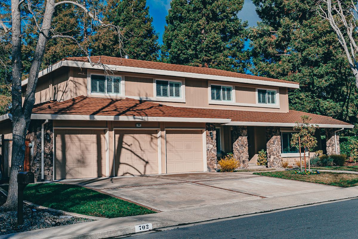 Clean two-story suburban home with driveway