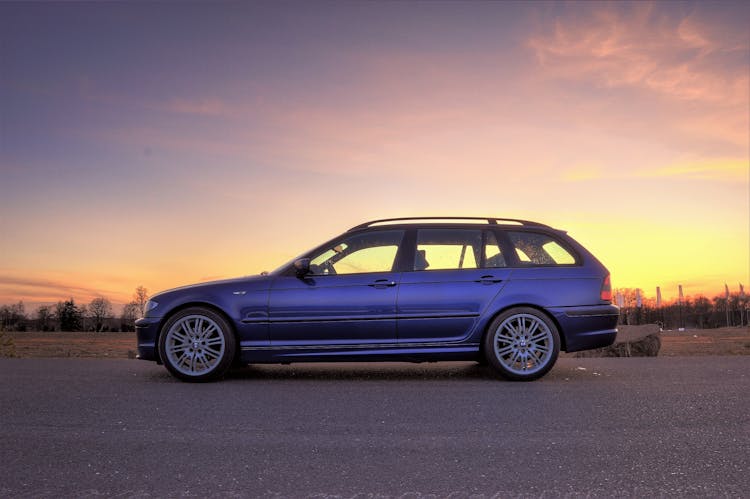 Side View Photography Of Car During Dawn