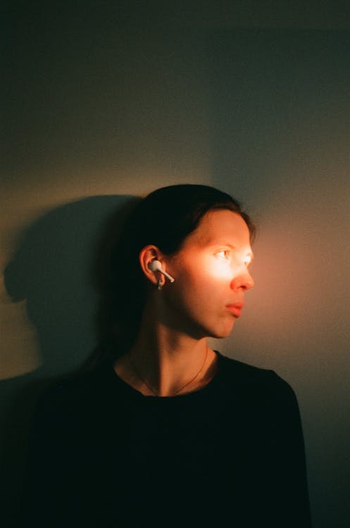 Sunlight Reflecting on Womans Face