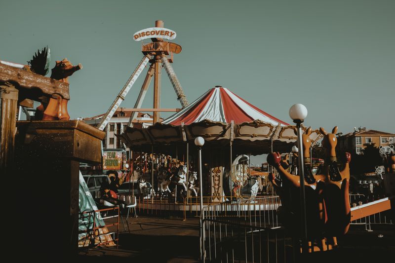 Classic carousel and amusement park rides at a theme park