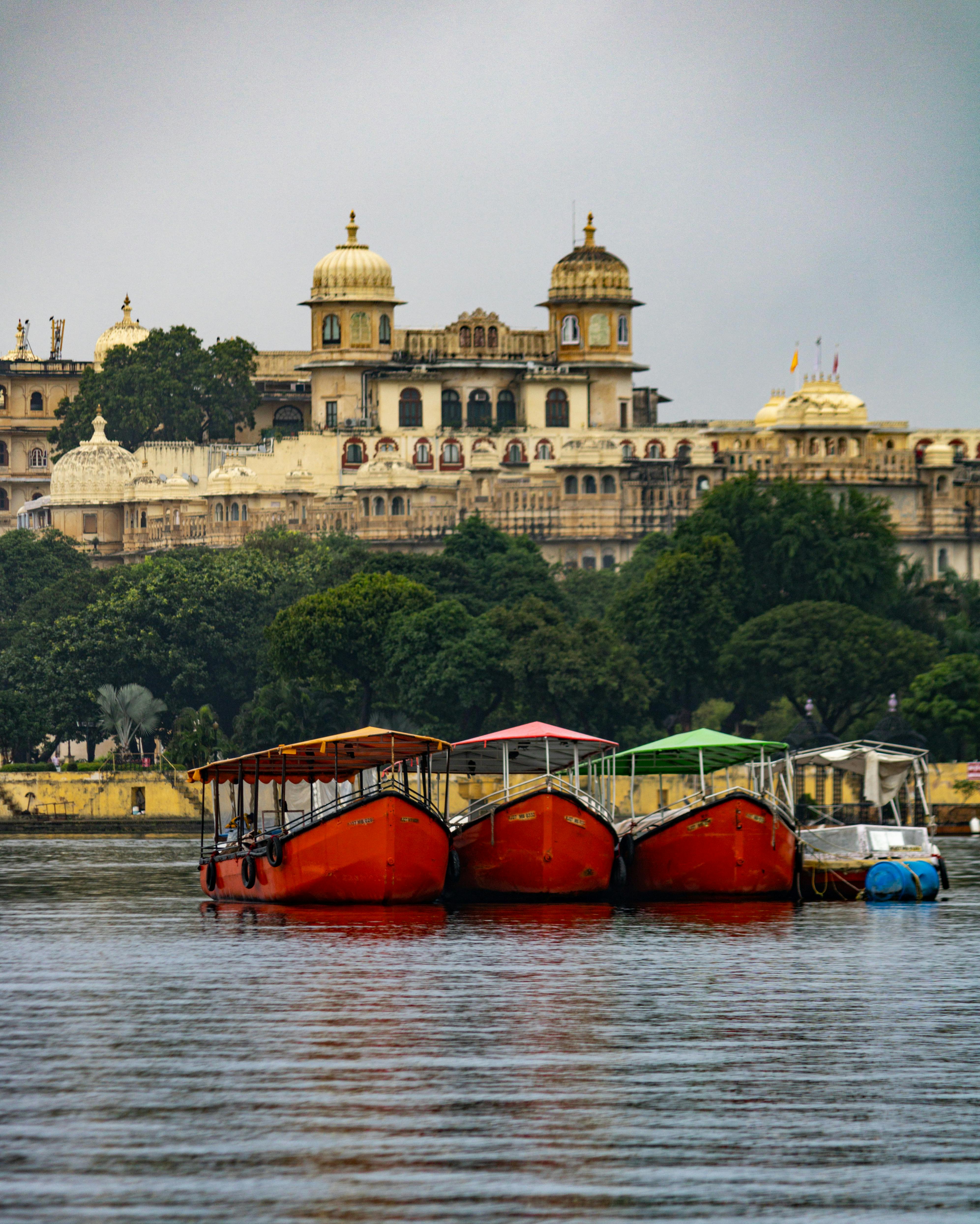Boats floating on a calm body of water
