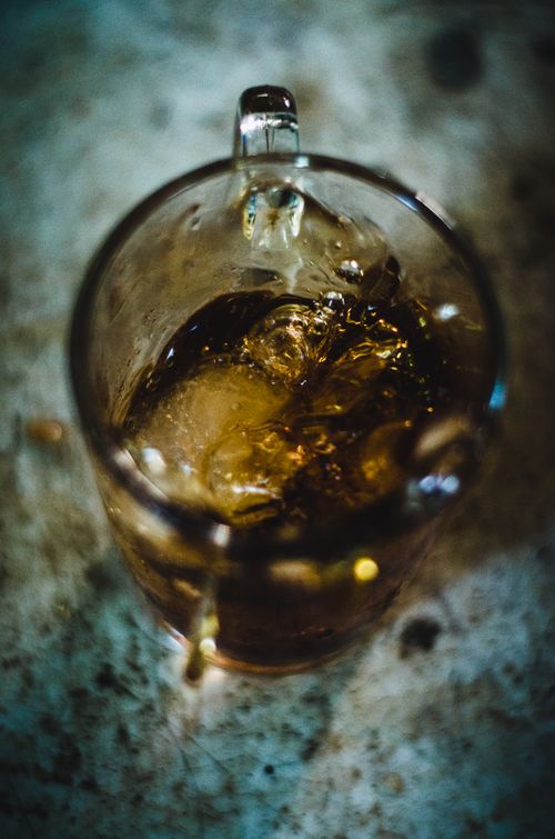 Free Close-up of a cold iced drink in a glass cup, perfect for refreshing moments. Stock Photo