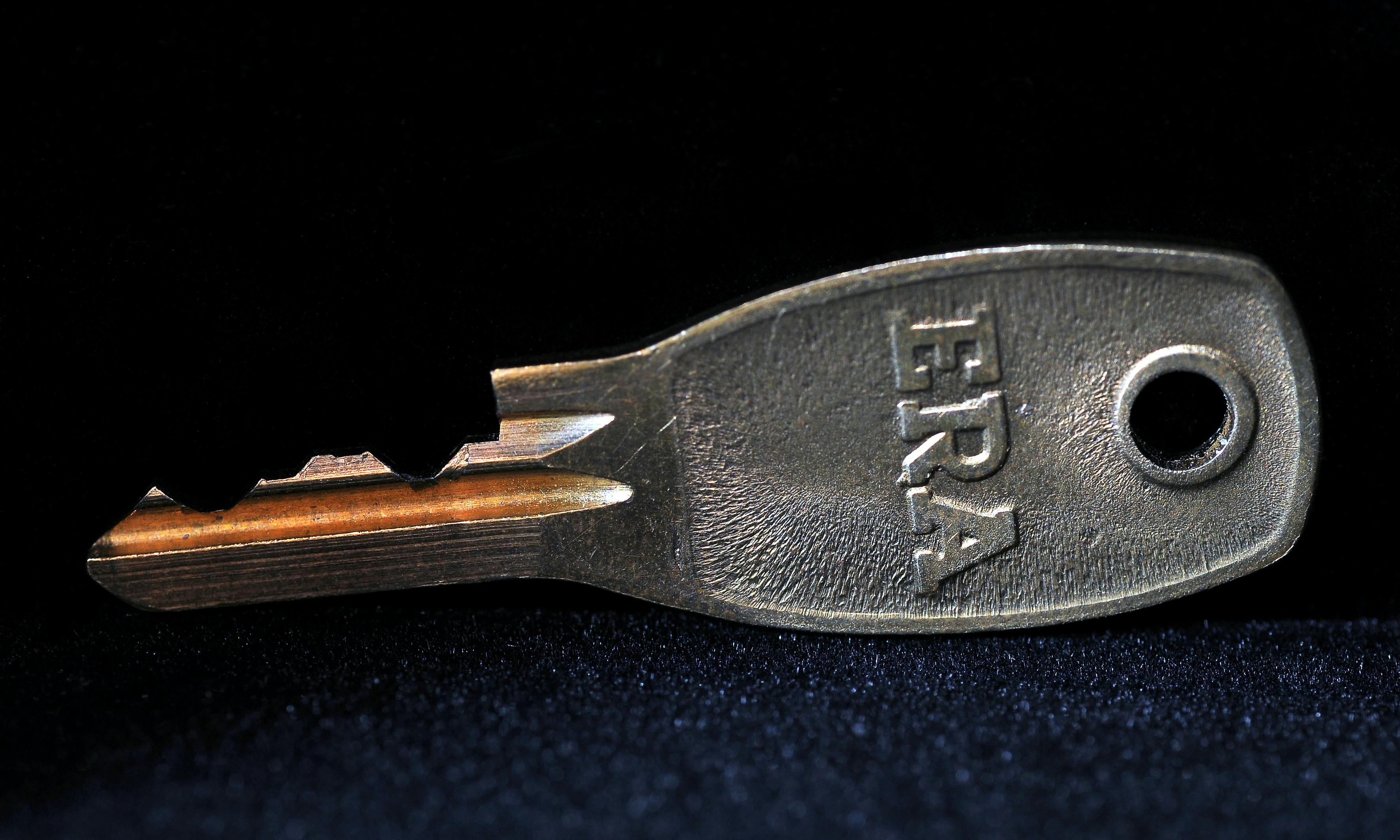Free stock photo of Macro shot of a small window key