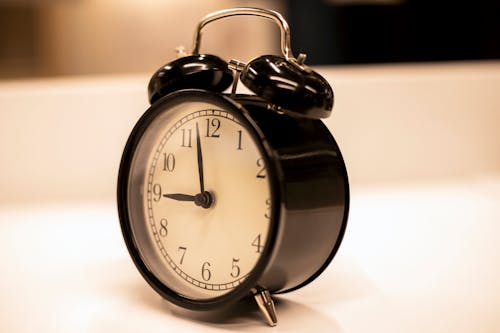 

A Close-Up Shot of an Alarm Clock