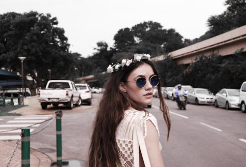 Photography of a Woman Wearing Vintage Sunglasses