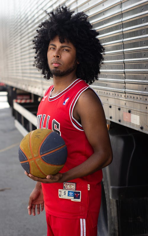 Free Man with Basketball Ball Stock Photo