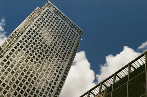 Buildings under White Clouds and Blue Sky