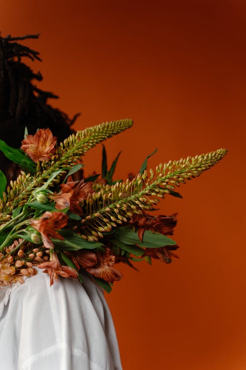 Bouquet of Flowers on a Person's Shoulder