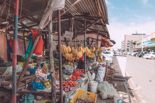 Vibrant street market in Ruaka, showcasing fresh fruits and vegetables for sale.