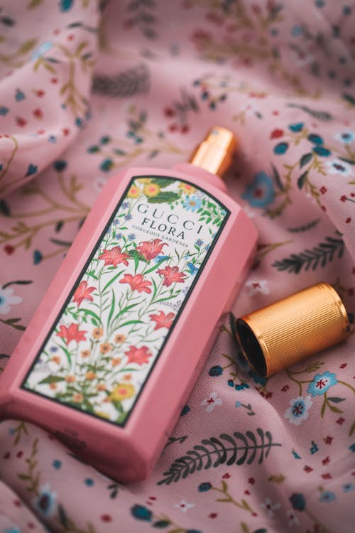 Close-Up View of Pink Bottle of Perfume