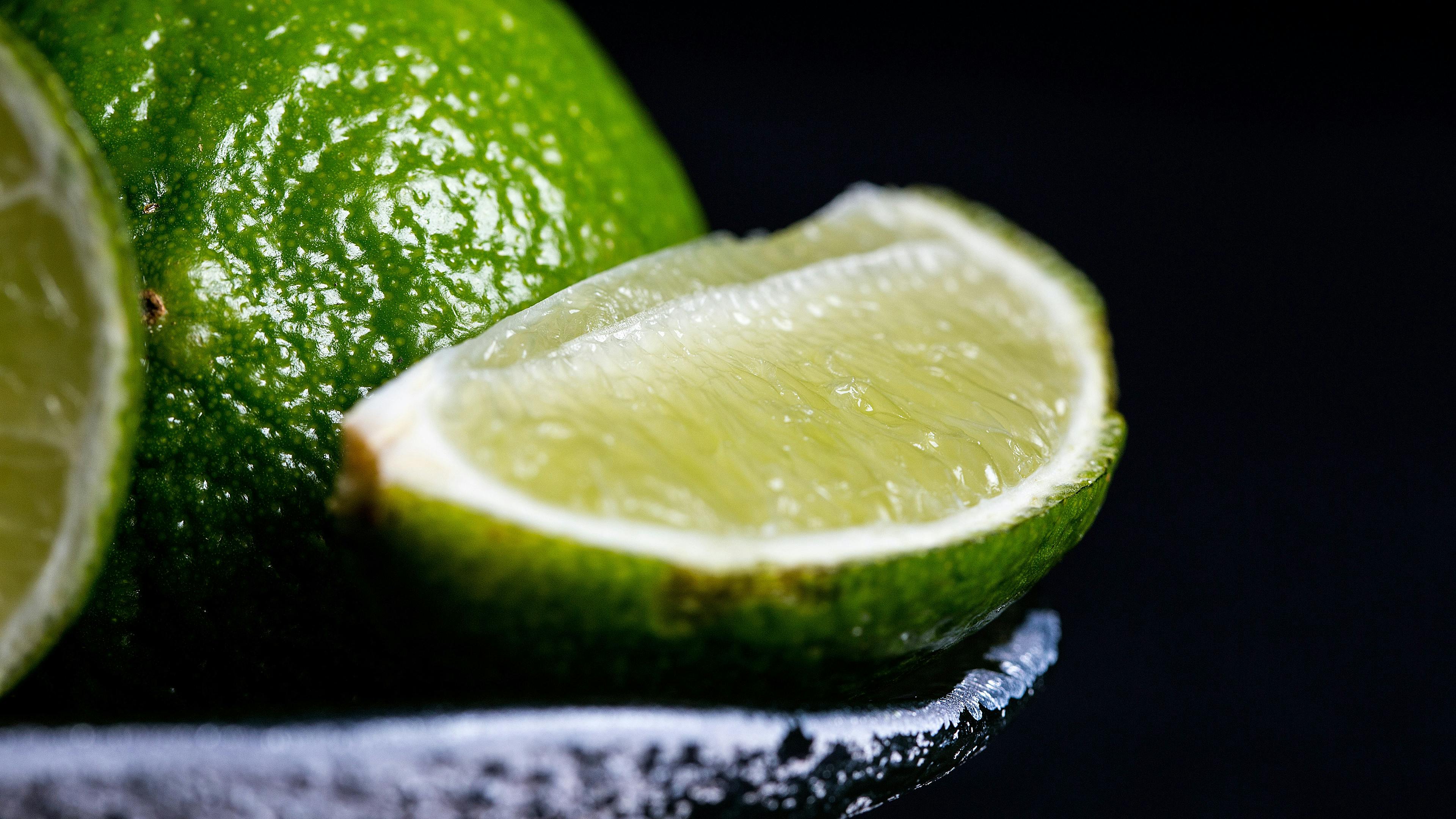 Cricket stadium under lights with fans in the stands