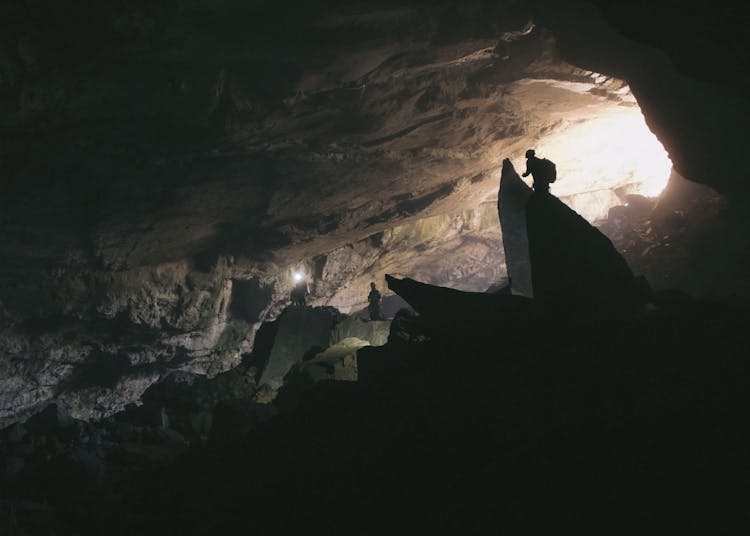 People Inside A Cave