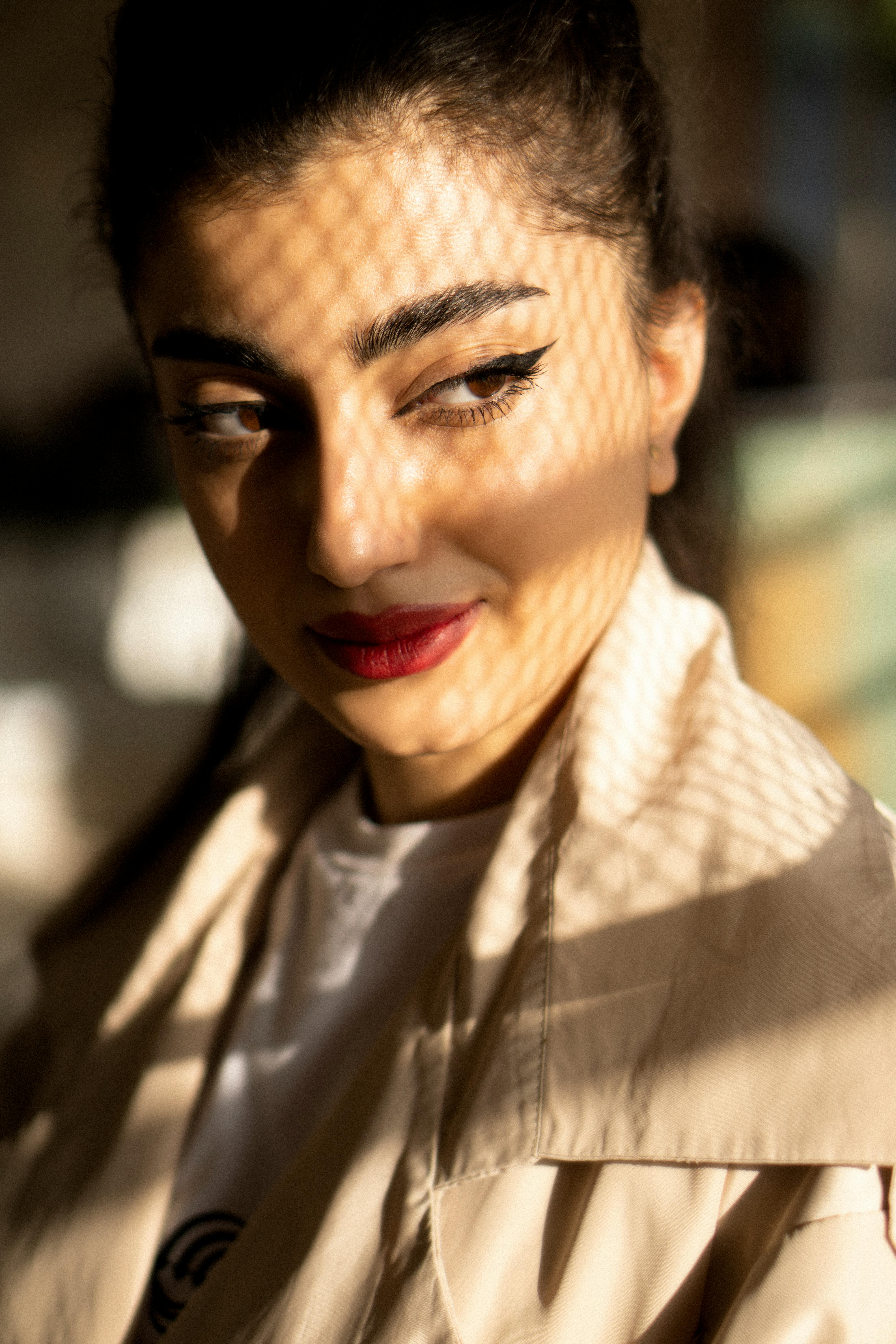 woman with make up and ponytail