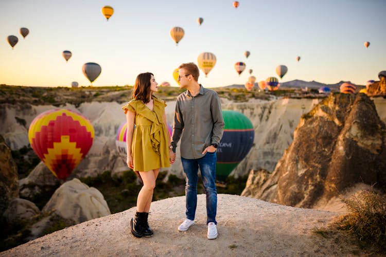 Couple Against Air Balloons