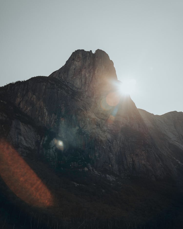 Back Lit Mountain With Reflecting Sunbeams