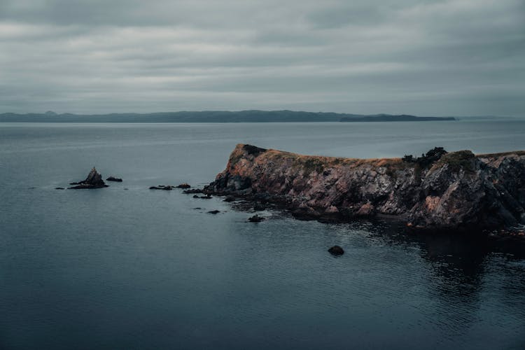 Rocky Outcrop Leading Into Sea