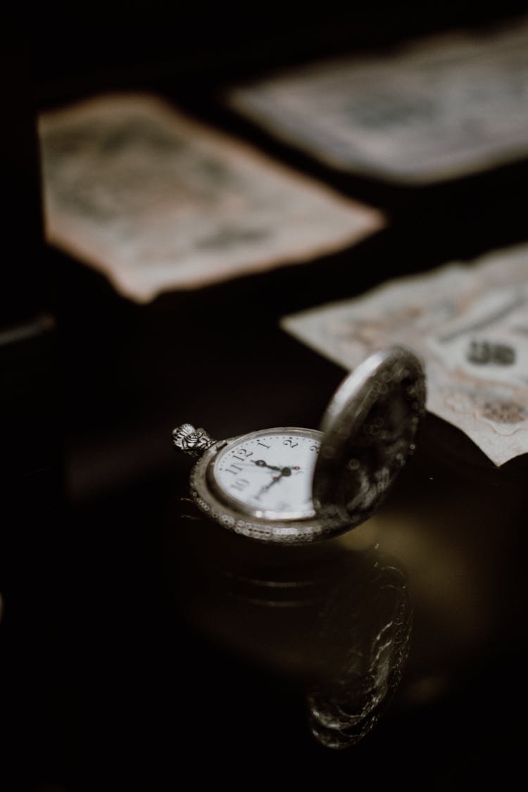 Pocket Clock And Banknotes