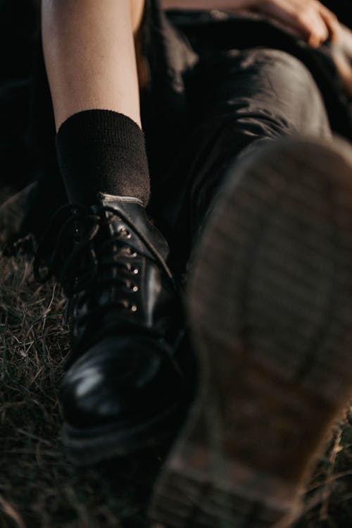 Free Close-Up View of Black Leather Boots Stock Photo