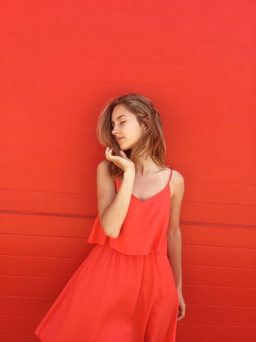 Woman Wearing Orange Spaghetti-strap Dress