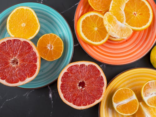 Free Overhead Shot of Slices of Citrus Fruits Stock Photo