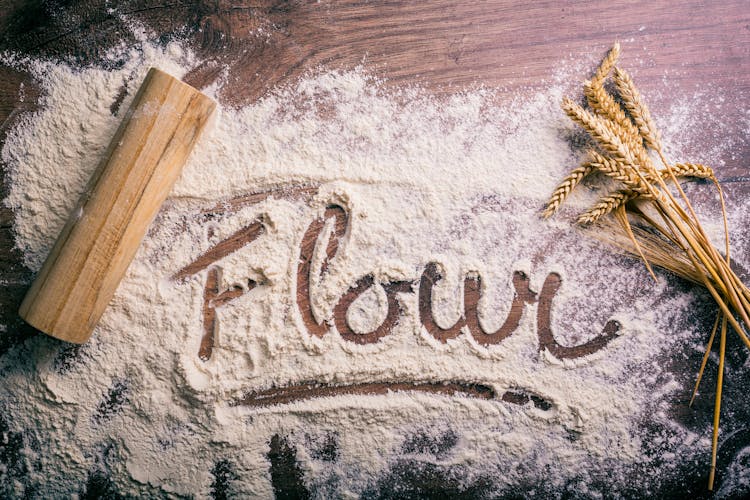 Flour Spilled On The Wooden Table 