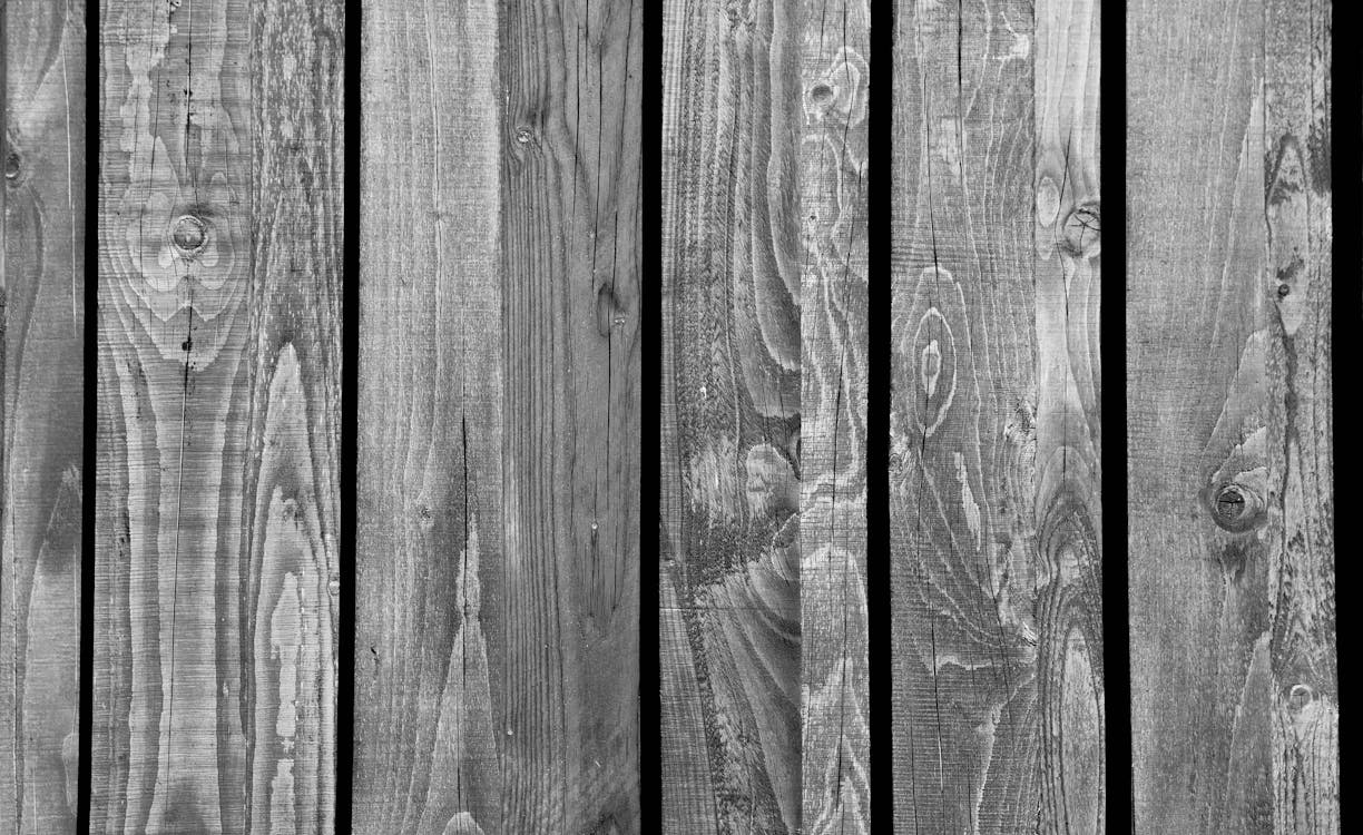 Grayscale Photo of Wood Pallet