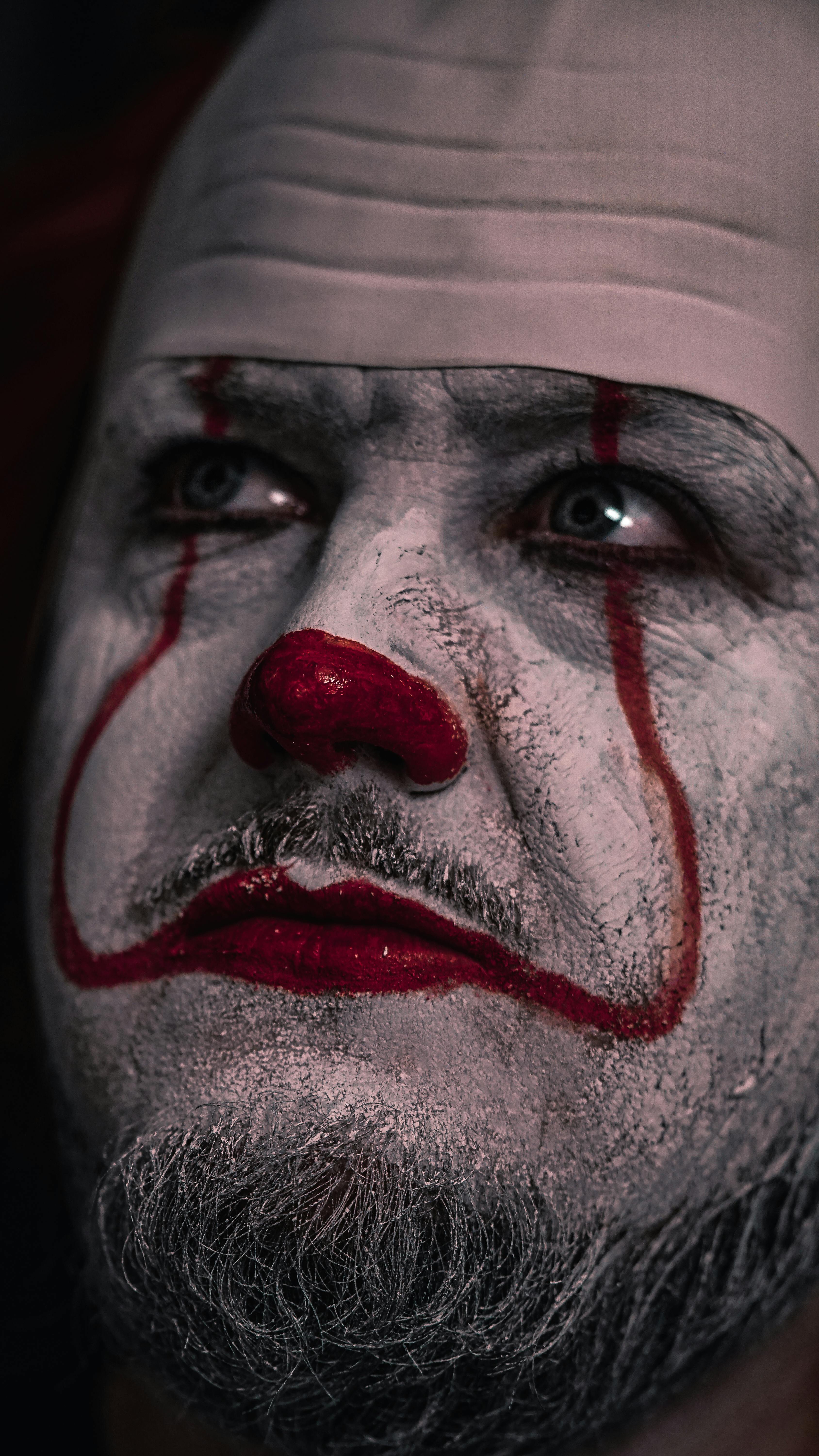 A Man Costumed as Pennywise Making Scary Face Reaction · Free Stock Photo