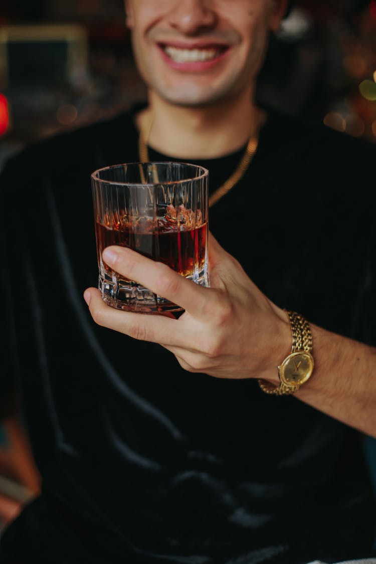 Close-up Of Man Holding Drink