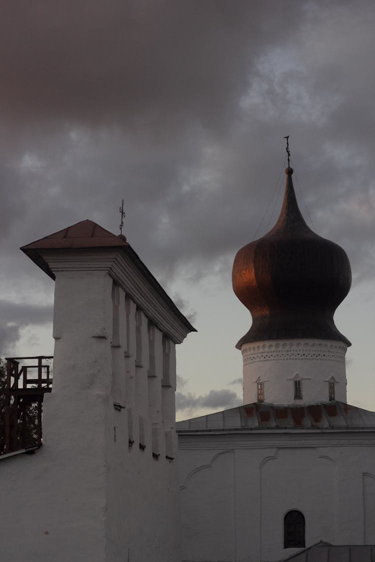 Church Temples Against Storm Dark Sky