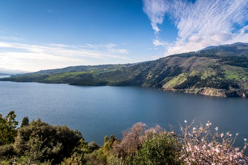 Free Beautiful tranquil landscape of a lake surrounded by mountains in Mila, Algeria. Stock Photo