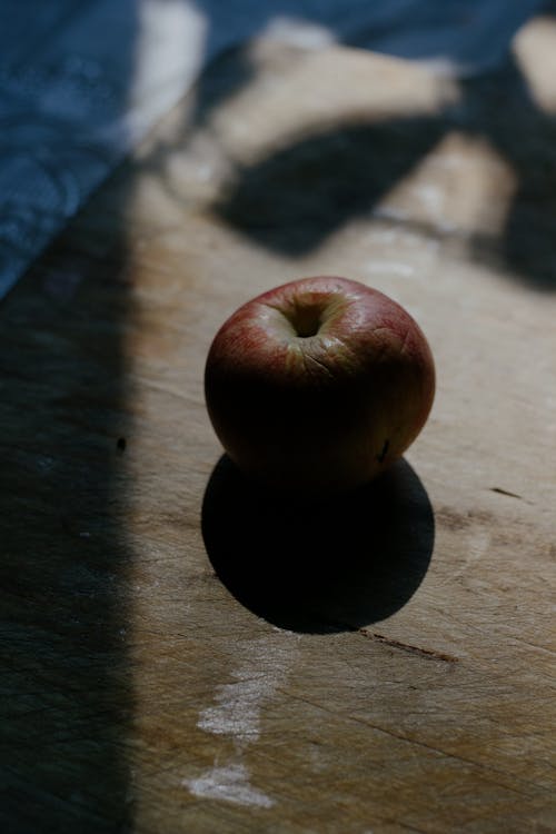 An Apple on Cutting Board 