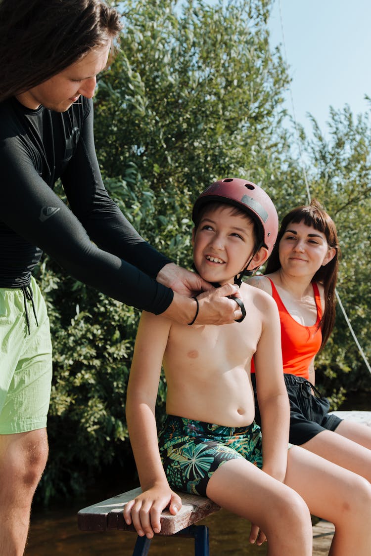 Family Preparing For Wakeboarding