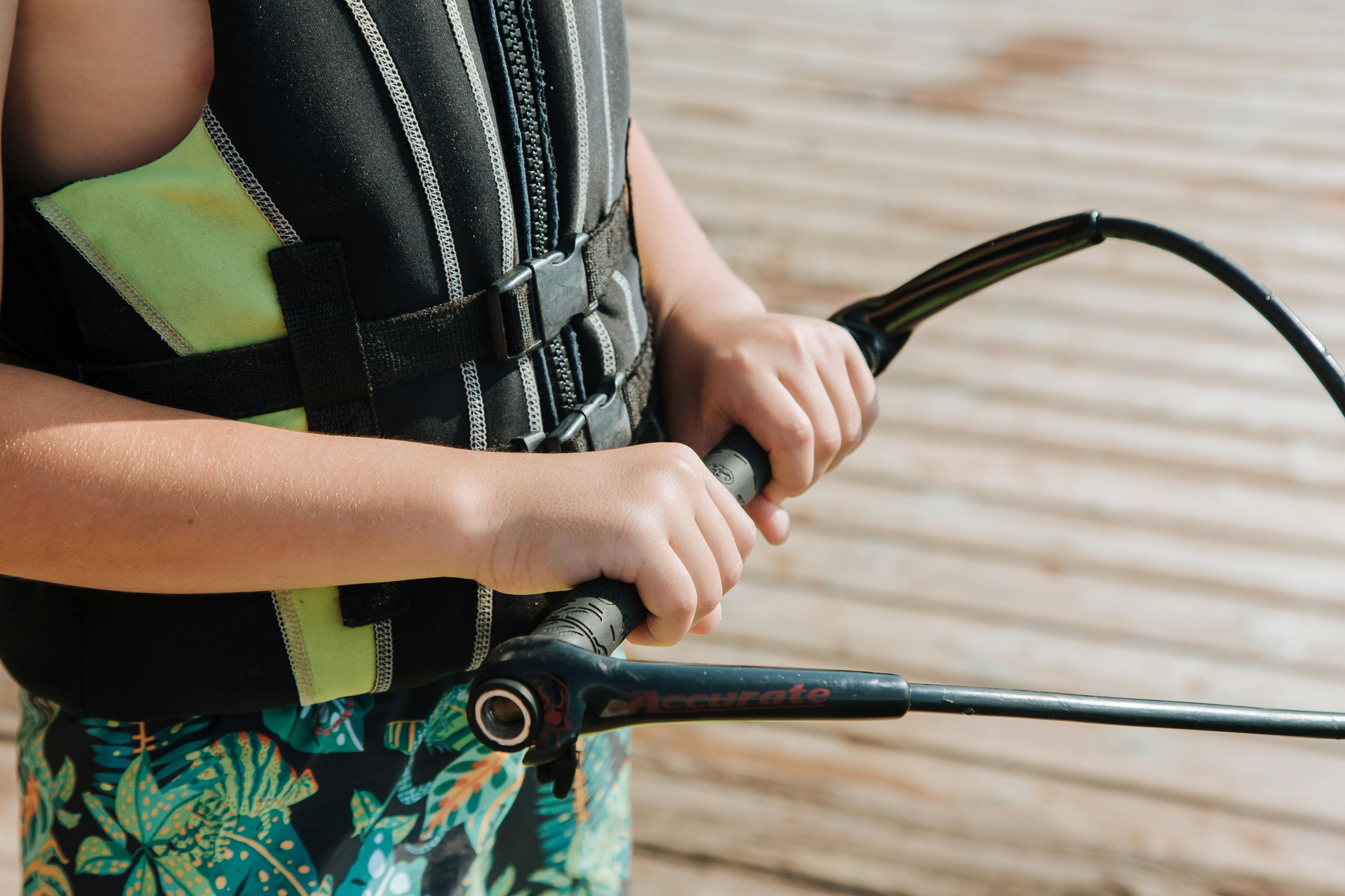 Closeup of Boy Holding Wakeboarding Handle · Free Stock Photo