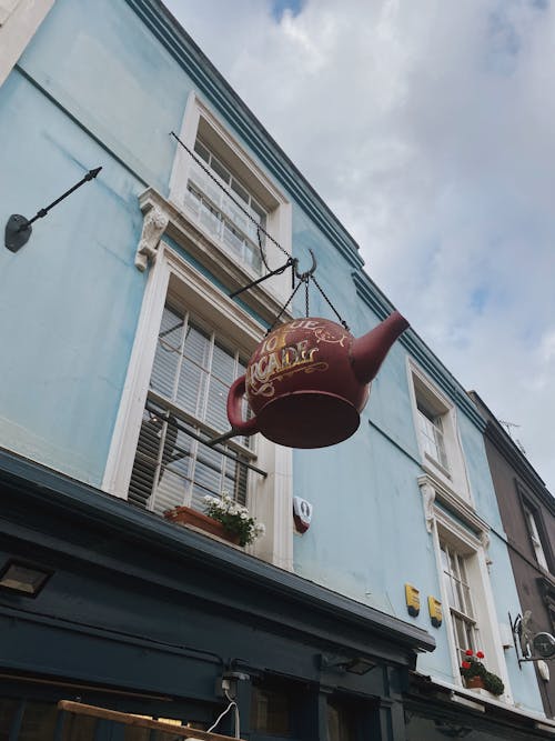 Sign on Facade of Cafe