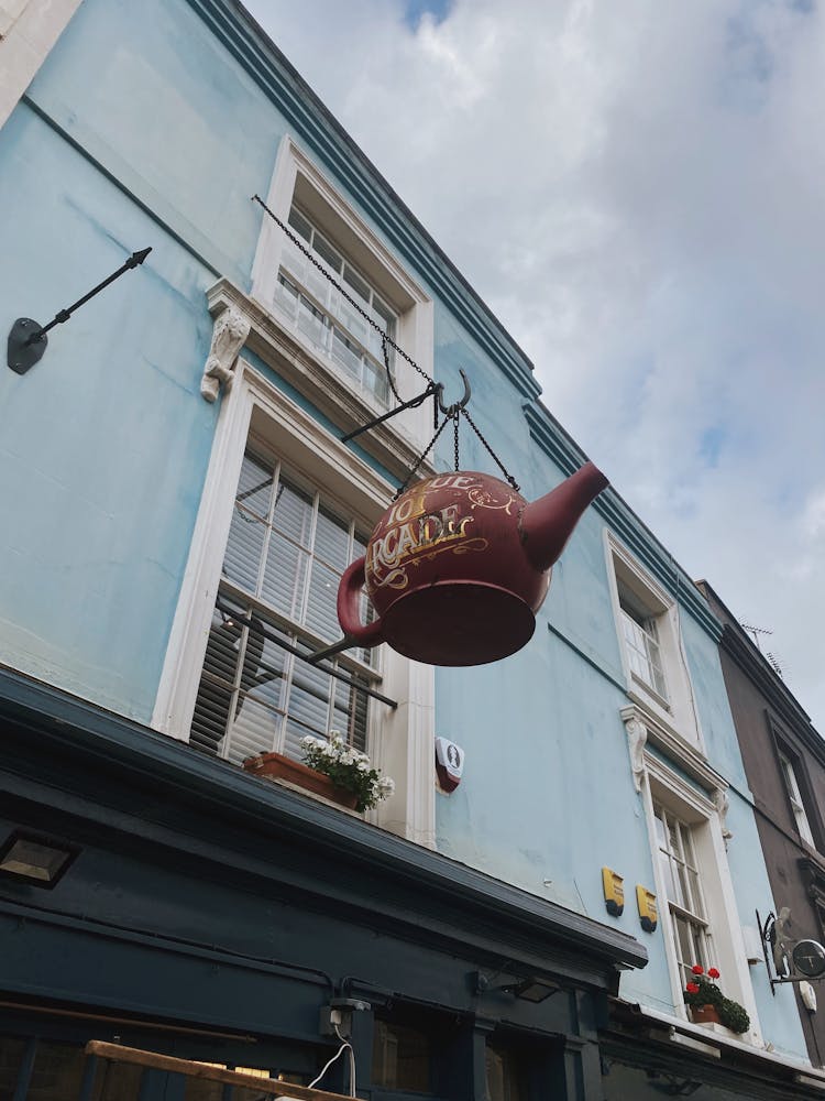 Sign On Facade Of Cafe