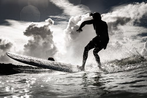 Man Surfing on Sea