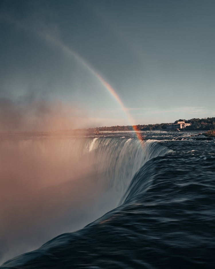 Waterfall And Rainbow