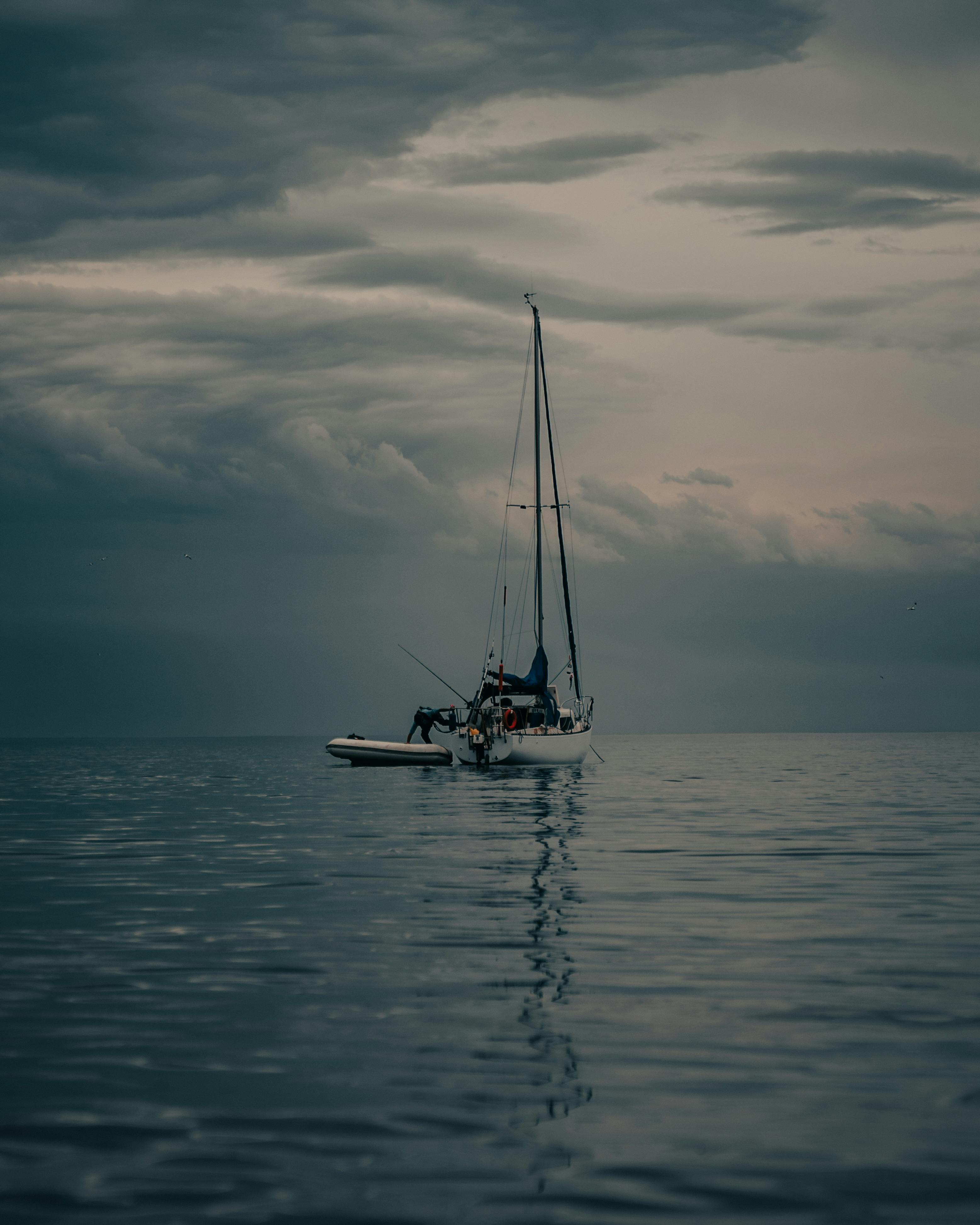 Yacht on Sea Against Cloudy Sky · Free Stock Photo