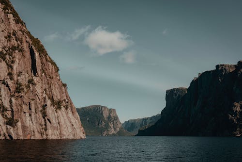 A Body of Water Between the Rock Formations