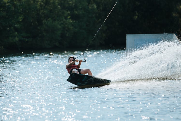 Woman Sliding On Wakeboard