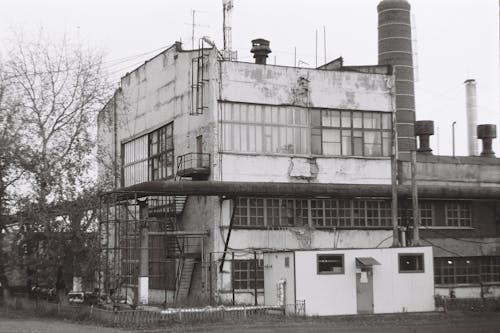 Grayscale Photo of an Abandoned Building