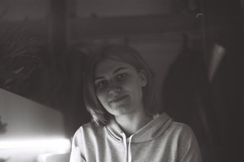Free Grayscale Photo of a Woman Wearing Hoodie Stock Photo